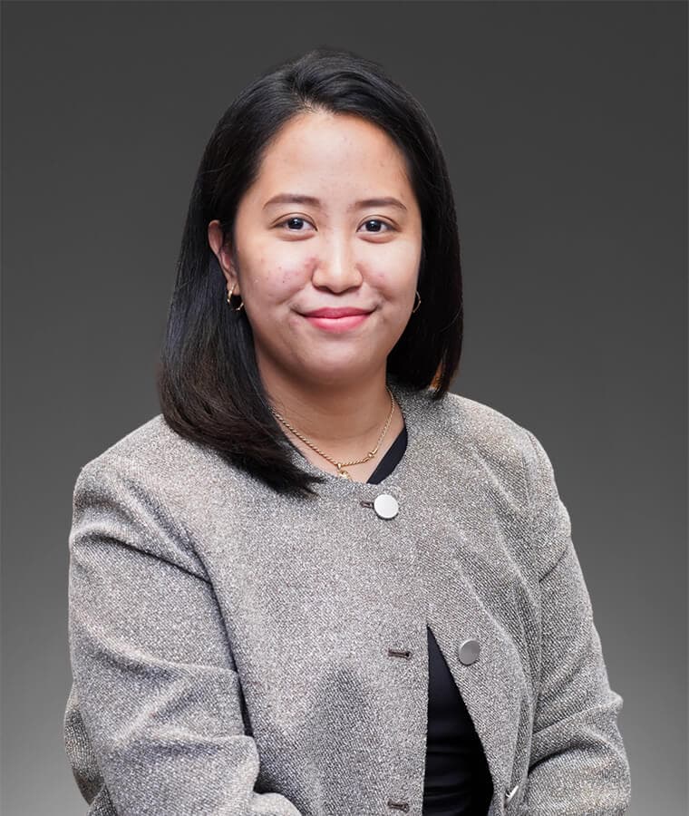 Alyssa Barcelona, legal assistant at Barrett Farahany, evaluating case documents